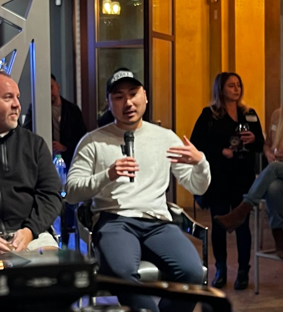 Kyler speaking on a panel