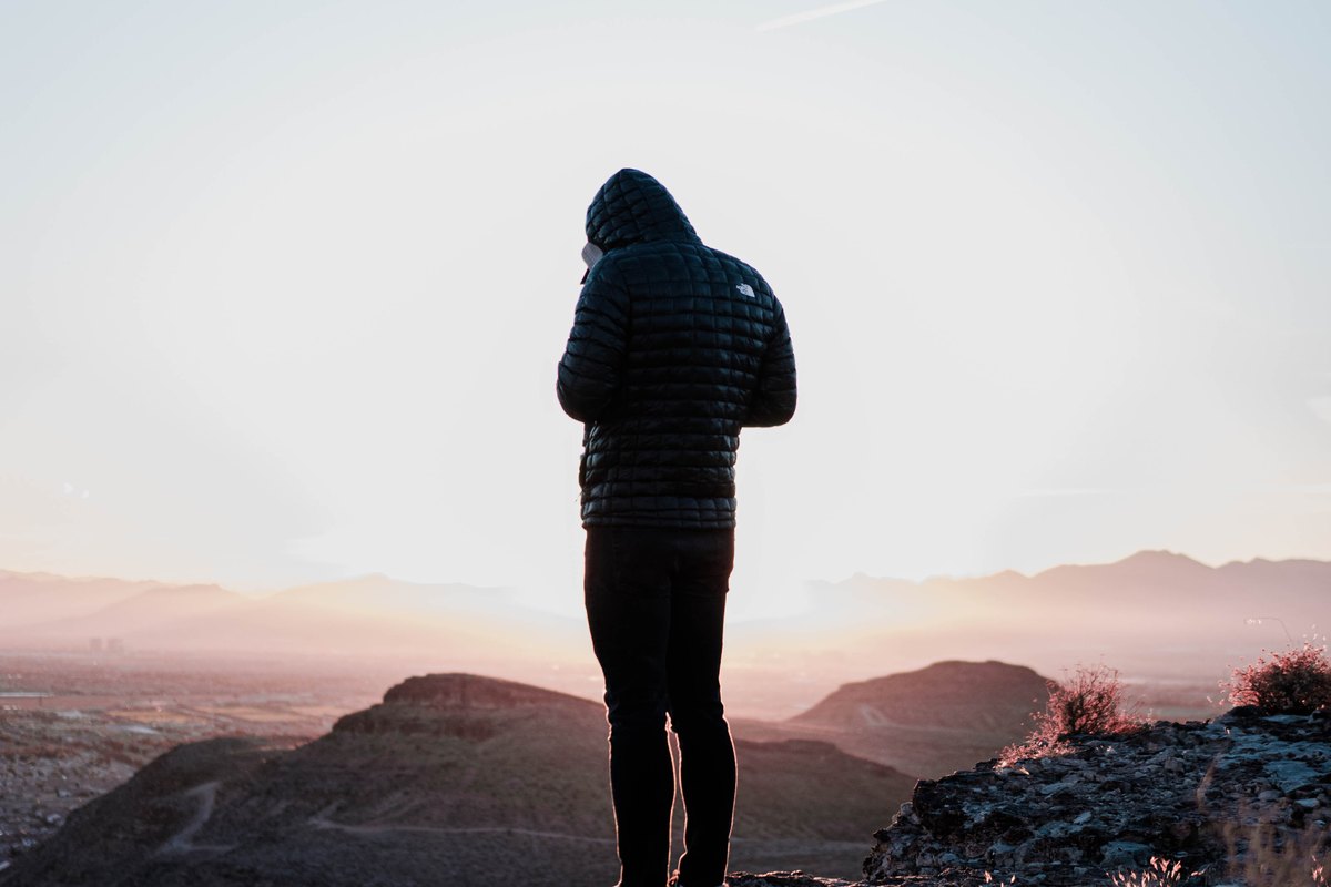 Kyler at a desert overlook at sunrise